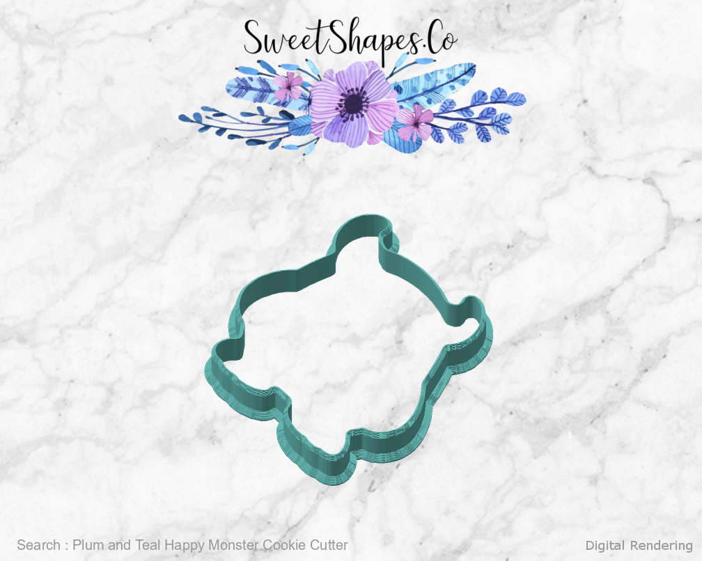 Plum and Teal Happy Monster Cookie Cutter — angled front view