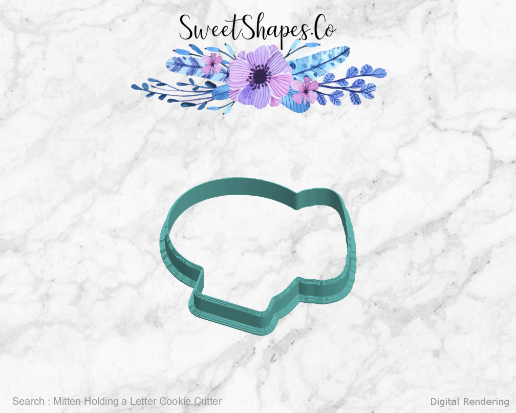 Mitten Holding a Letter Cookie Cutter — left view
