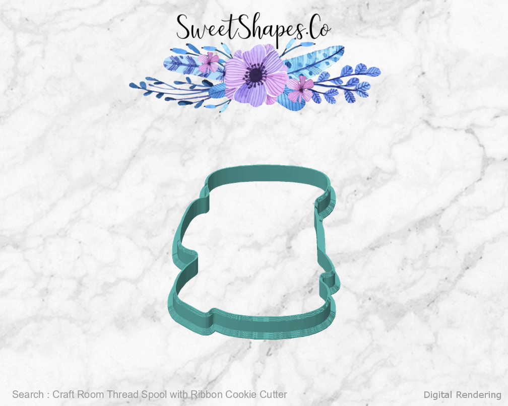 Craft Room Thread Spool with Ribbon Cookie Cutter — front view