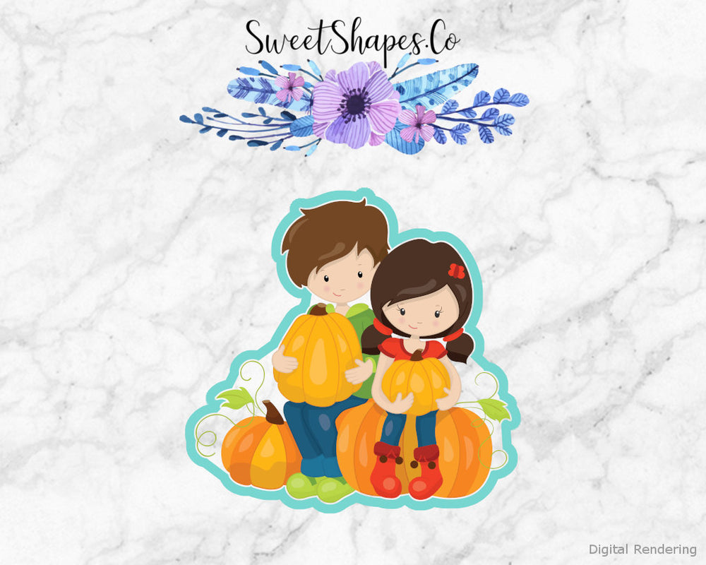 Couple Sitting on Pumpkins Cookie Cutter